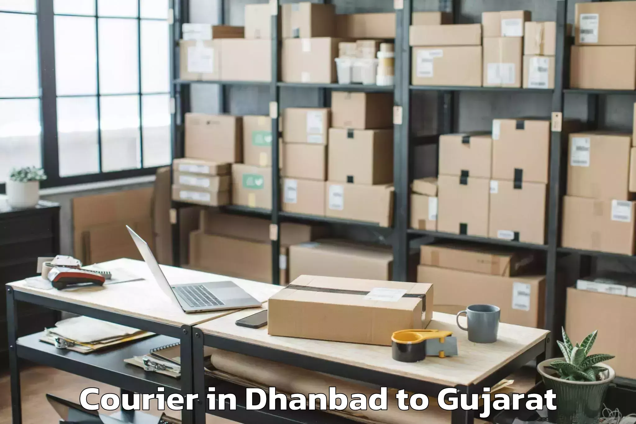 Easy Dhanbad to Valod Courier Booking